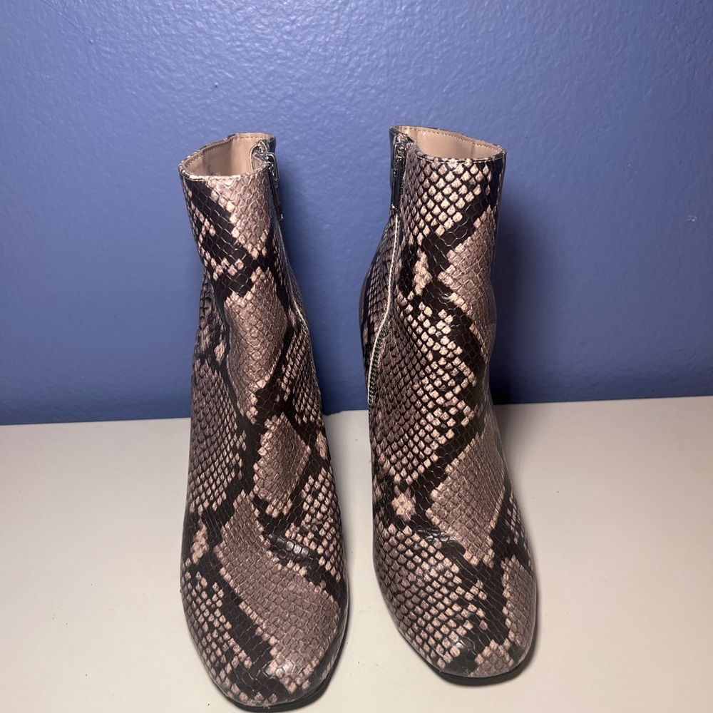 Steve Madden Brown and Black Ankle Booties with Sleek Design